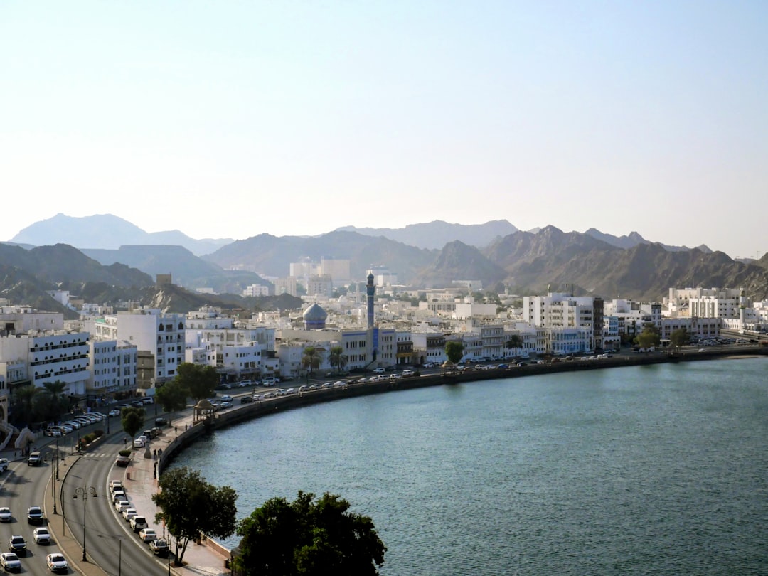 Muscat cityscape representing Oman as a software engineering delivery location